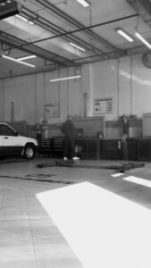 common car body repairs include mix body filler and spray paint with protective clothing and other safety equipment