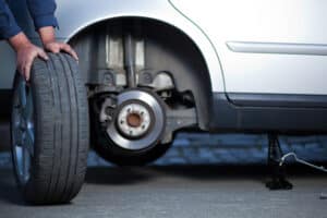 changing spare tire - speed limit for distracted drivers