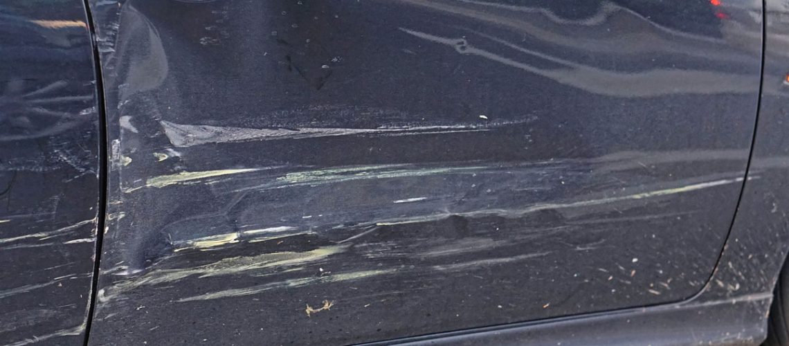 Damaged Car Door - auto body shop idaho falls